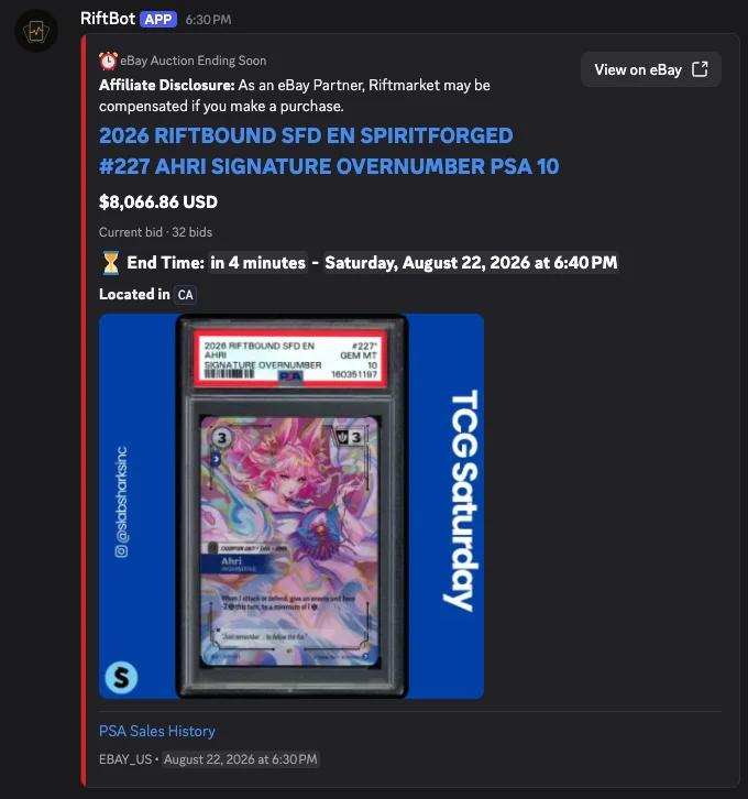 Example Discord auction alert showing a large graded card image, current bid, auction end time, eBay link, and PSA Sales History link